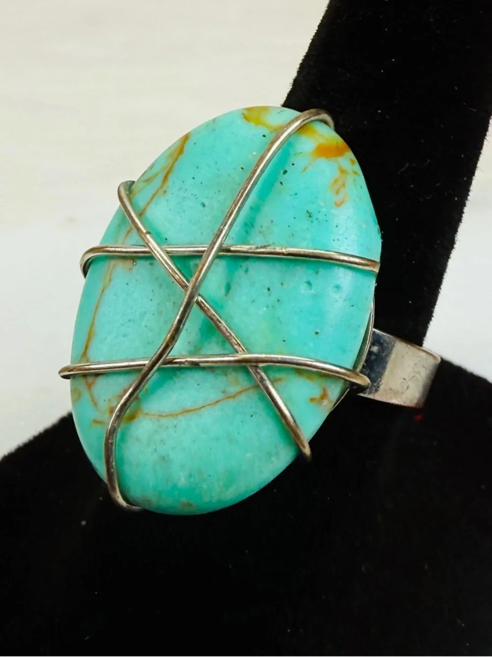 Aged silvertone, wire wrapped blue center size 6 adjustable costume ring